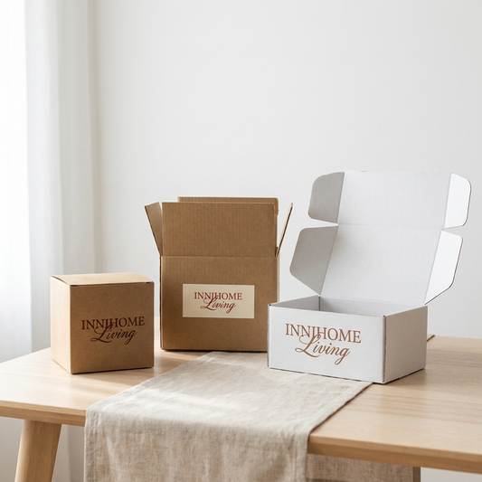 INNIHOME Living premium sustainable packaging featuring artisanal hand-woven elements and modern stainless steel structures.